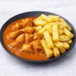 CHICKEN CURRY AND CHIPS